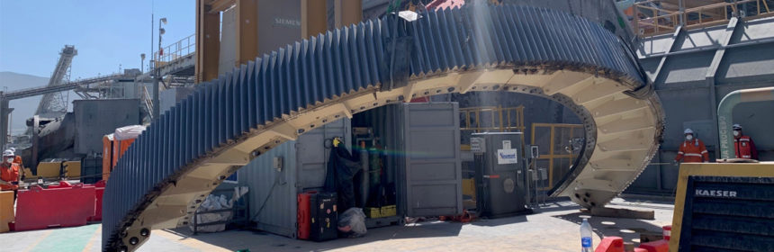 Prime Field Service Millwrights rigging and lifting Sag Mill half gear for install on Mill.